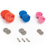 An assortment of silicone purge plugs in red 2.", blue 1.5", and pink 1.25" schedule nominal pipe with stainless steel mesh diffusers and titanium argon inlet tubes. for high purity turbo manifold fabrication
