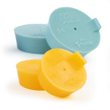 TIG Aesthetics assortment motorsport automotive exhaust kit of silicone pipe plugs in various sizes and colors (yellow, cyan) with stainless steel mesh diffusers and titanium argon inlet tubes.