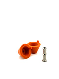 TIG Aesthetics Burnt Orange silicone purge plug disassembled, 1 inch NPS pipe, titanium inlet tube visible designed for industrial pipe welding and gas-purge applications