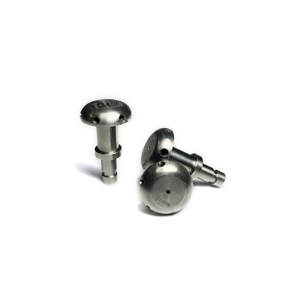 Three pieces of raw titanium Quick Disconect shower head diffusers with precision CNC machined outlet ports, displayed against a white background with TIG Aesthetics and Ticon logo laser etched on the bottom of the part.