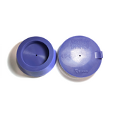 Two purple silicone purge plugs for high purity tube welding with mesh diffuser for laminar argon flow and small tube to attach hose
