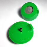Two green silicone purge plugs for high purity tube welding with mesh diffuser for laminar argon flow and small tube to attach hose
