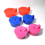 An assortment of silicone purge plugs in red 2.", blue 1.5", and pink 1.25" schedule nominal pipe with stainless steel mesh diffusers and titanium argon inlet tubes. for high purity turbo manifold fabrication
